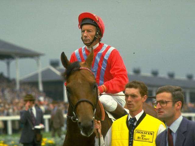 Legendary jockey Lester Piggott on Commanche Run before the St. Leger at Doncaster in 1984. Piggot won the race and broke the all time Classic winning record by achieving his 28th Classic win. Photo: Allsport UK /Allsport/Getty
