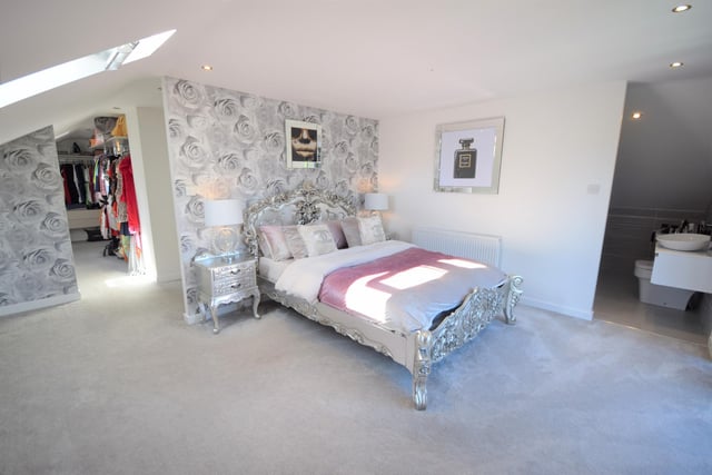 This home has four bedrooms which are ensuites, with two of the bedrooms having a Jack and Jill ensuite. The master bedroom also has a walk-in wardrobe, beautiful ensuite bathroom and even a balcony.