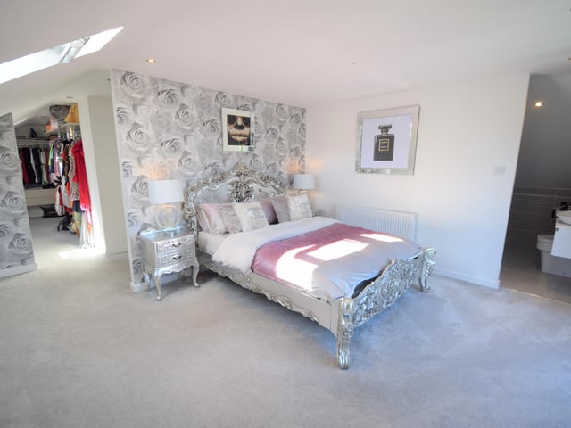 This home has four bedrooms which are ensuites, with two of the bedrooms having a Jack and Jill ensuite. The master bedroom also has a walk-in wardrobe, beautiful ensuite bathroom and even a balcony.