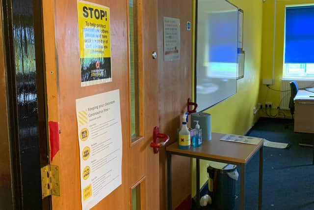 Hand sanitising equipment at Astrea Academy Woodfields