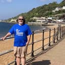 Neil walking along the coast as part of his We Walk for Yorkshire challenge.