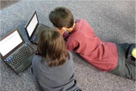 School pupils were subjected to naked men exposing themselves and committing sex acts in an online lesson.
