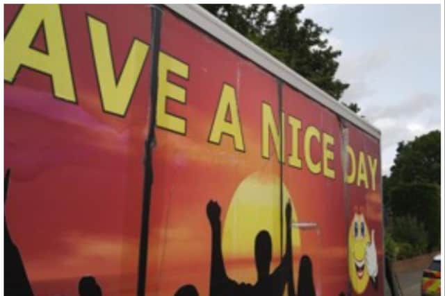 The van was emblazoned with the message 'Have a Nice Day.'