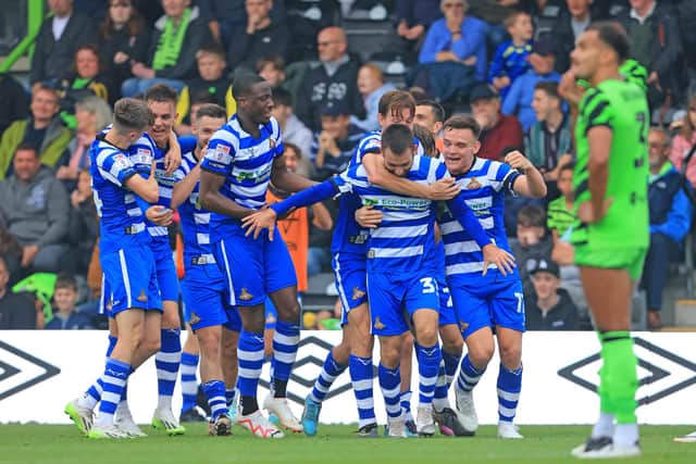 Doncaster Rovers' Ben Close is mobbed by his team mates after his injury time winner against Forest Green Rovers.