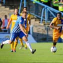 Mitchell Rose in action for Mansfield Town. Photo: Chris Holloway