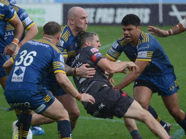 Shane Toal is brought to a halt by Sam Smeaton and Aaron York. Photo: Rob Terrace