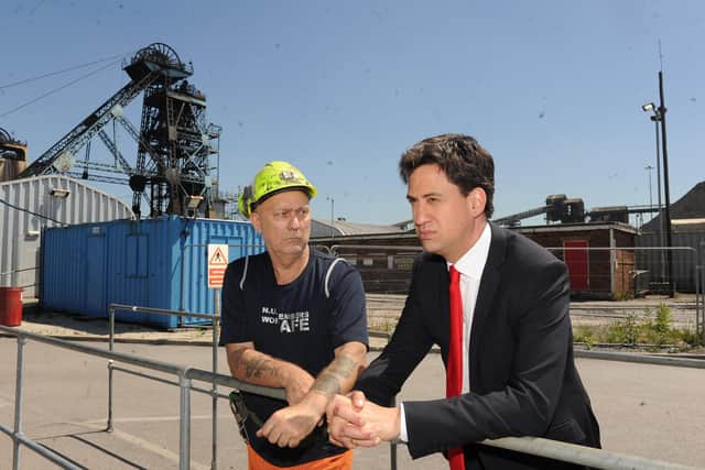 30 June 2015...Ed Miliband MP chats with Dennis Crew during his visit to Hatfield Colliery near Doncaster on the day it was announced it is to close.Picture Scott Merrylees SM1008/81a