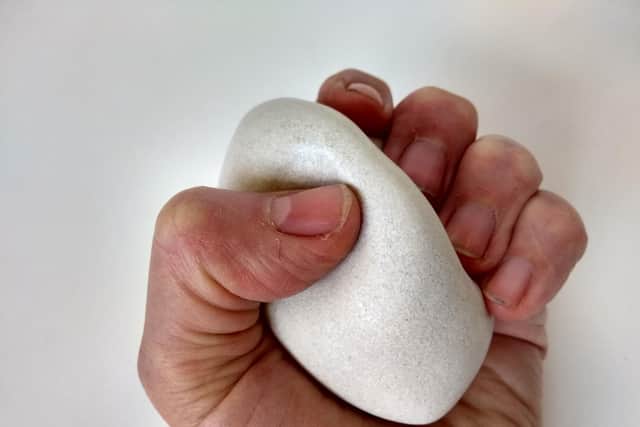 Sarah says that clay can be theraputuc and hopes that it will help the asylum seekers that she is working with.
