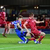 Doncaster Rovers striker Joe Ironside slots home the winning goal against Accrington Stanley.
