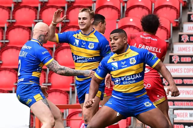 Dons' Alex Sutcliffe celebrates his try. Picture: Howard Roe/AHPIX.com