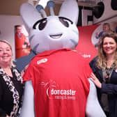 Doncaster Racecourse staff with the Active Fusion mascot.
