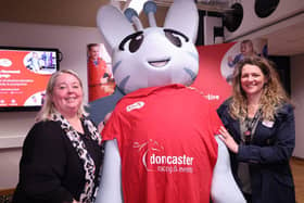 Doncaster Racecourse staff with the Active Fusion mascot.