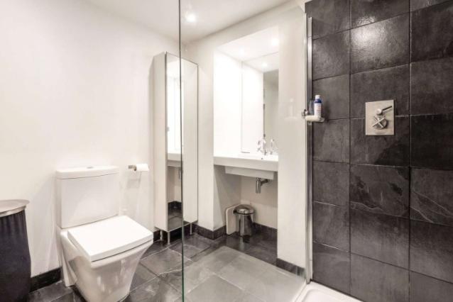 The contemporary bathroom is finished to a high standard and offers a range of amenities