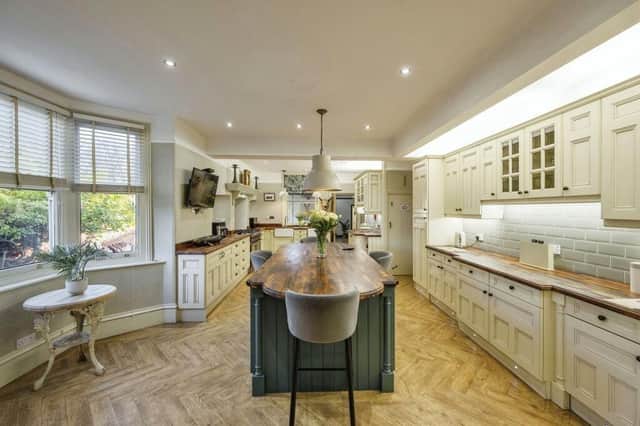 This stunning kitchen is just one highlight of this impressive property.