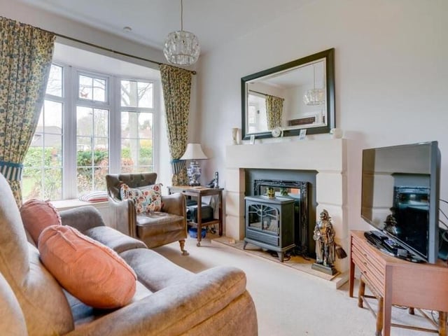 A cosy reception room with bay window.