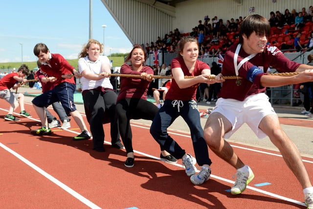 Hall Cross year nine students take part in a tug-of-war final during their sports day at the Keepmoat Stadium in June 2012