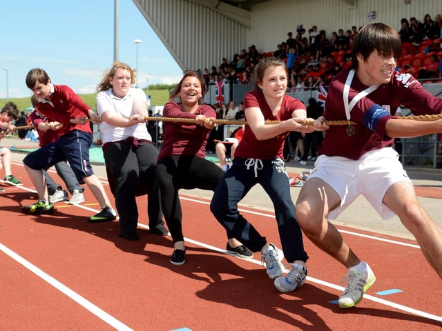 Hall Cross year nine students take part in a tug-of-war final during their sports day at the Keepmoat Stadium in June 2012