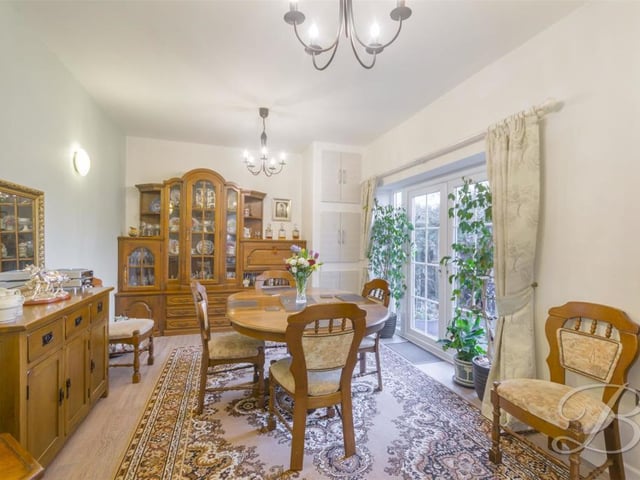 Next stop is the elegant dining room. Talk about dining in style! There is plenty of space for your choice of table and chairs.