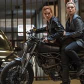 Scarlett Johansson as Black Widow/Natasha Romanoff and Florence Pugh as Yelena in Marvel Studios' BLACK WIDOW.