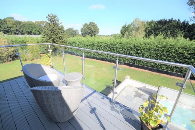 The balcony offers up amazing views into the garden, and offers a spot to relax in the sun.
