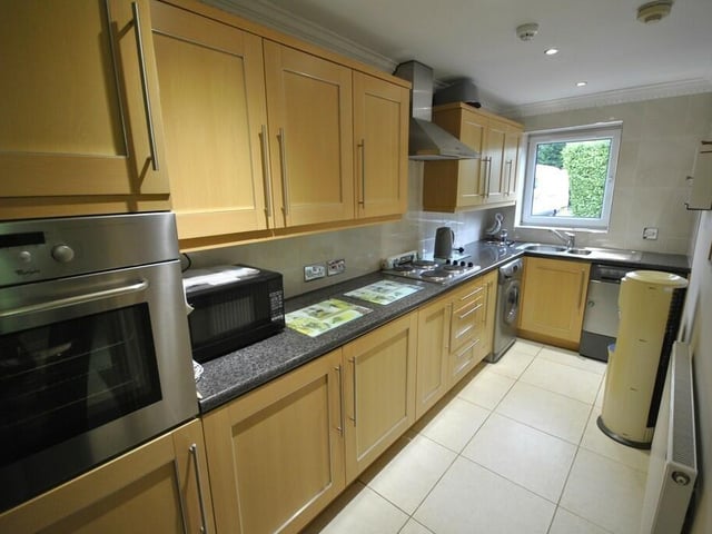 The fitted kitchen within the coach house.