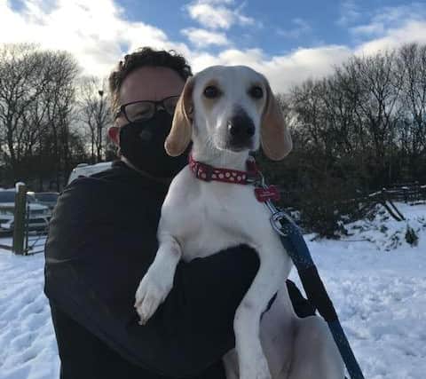Bella pictured with GoodLife volunteer walker Ian Ward.