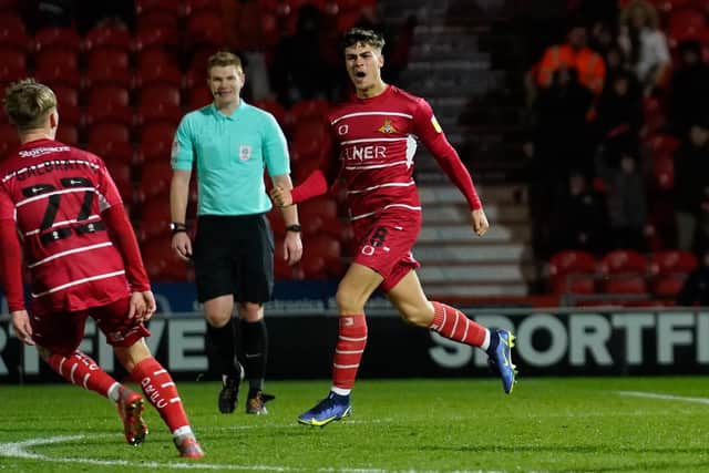 Doncaster's Branden Horton celebrates scoring his sides equaliser; Picture by Steve Flynn/AHPIX.com, Football: Skybet League 1 match Doncaster Rovers -V- Oxford United at The Keepmoat Stadium, Doncaster, South Yorkshire, England on 7/12/21 copyright picture Howard Roe 07973 739229