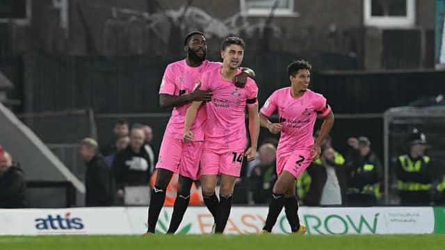 Harrison Biggins celebrates his goal.
