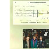 Noel Gallagher with Rick Harrison (left) and Eric Haydock of The Hollies after a shopping trip to Music Ground in December 1994 - with the cheque - signed by the star - showing how he forked out £2,250.