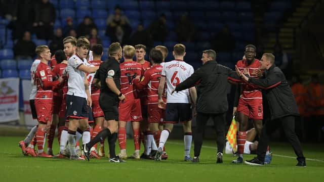 Richie Wellens implores referee Stephen Martin not to send off Joseph Olowu at Bolton Wanderers. Picture: Howard Roe/AHPIX