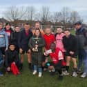 Parents and coaches took part in a fundraising football match.