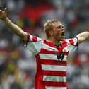 Paul Green celebrates victory with Doncaster Rovers in the 2008 League One play-off final against Leeds United. Photo by Clive Rose/Getty Images