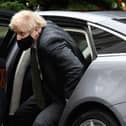 LONDON, ENGLAND - DECEMBER 09: British Prime Minister Boris Johnson returns from the weekly PMQ sessions in the House of Commons, at Downing Street on December 09, 2020 in London, England. (Photo by Leon Neal/Getty Images)