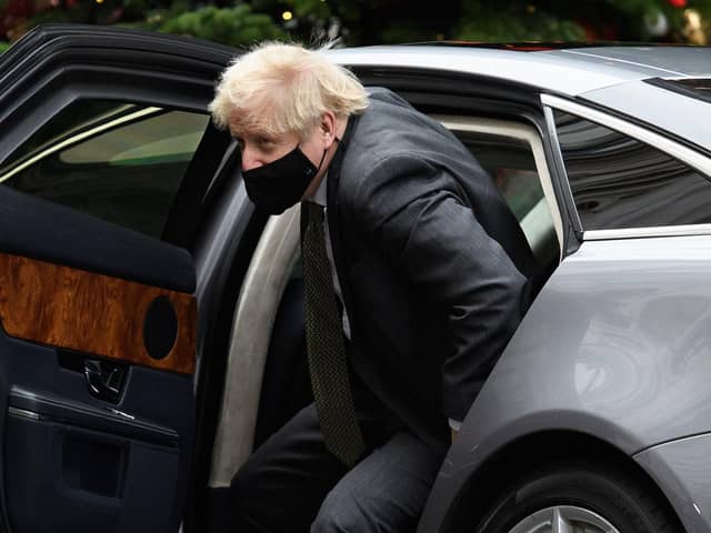 LONDON, ENGLAND - DECEMBER 09: British Prime Minister Boris Johnson returns from the weekly PMQ sessions in the House of Commons, at Downing Street on December 09, 2020 in London, England. (Photo by Leon Neal/Getty Images)