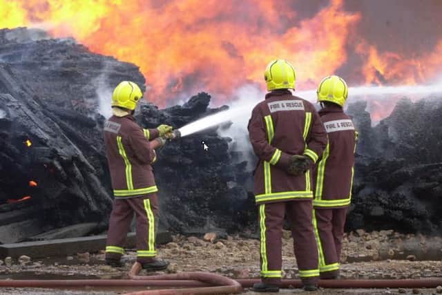 File picture shows South Yorkshire fire fighters fighting a blaze