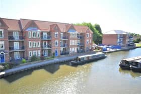 The canalside property for sale is within a block of just two apartments per floor, situated on a no-through road.