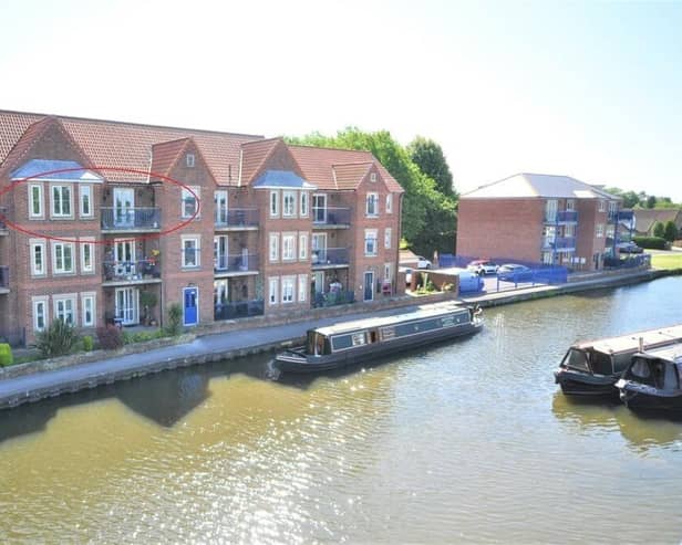 The canalside property for sale is within a block of just two apartments per floor, situated on a no-through road.