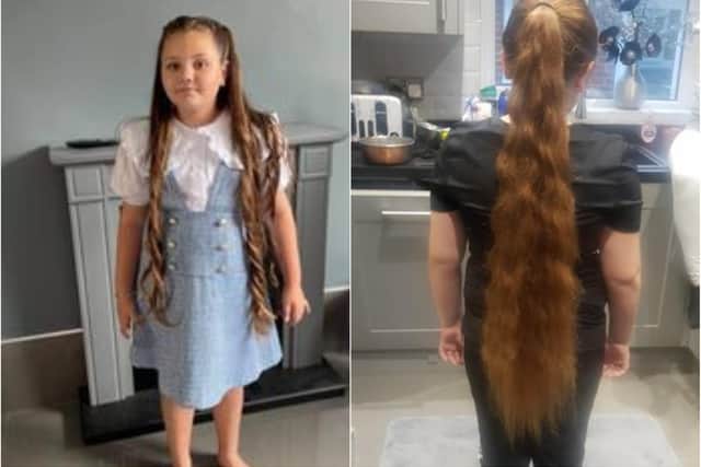 Ella is having her hair cut to help young cancer victims.
