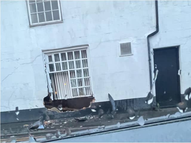 The damage to the White Hart after it was hit by a car. (Photo: Paige Ibbotson).