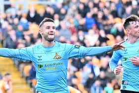 Doncaster Rovers are currently fourth in the League Two table.