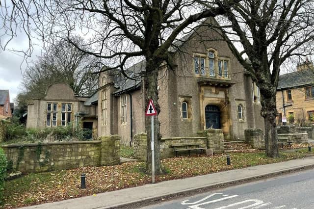 A front view of the building that's for sale in the leafy village of High Melton.