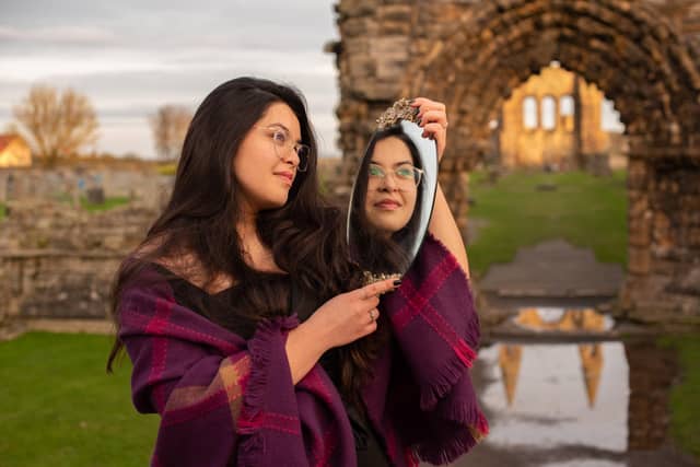 In the grounds of St Andrews Cathedral
Sophia Rink
As a marker of this unique and challenging period, we wanted to celebrate the essence of the St Andrews graduate during these unprecedented times. By recording their thoughts on life in 'the bubble' and beyond, we hoped, in a small way, to capture the spirit of our Saints of 2020. In a collaboration with graduating English Masters student Sophia Eve Rink, who came up with the theme of Reflections, we invited seven students still in the area to take part in a socially distanced outdoors photoshoot, in a location that was important to them.