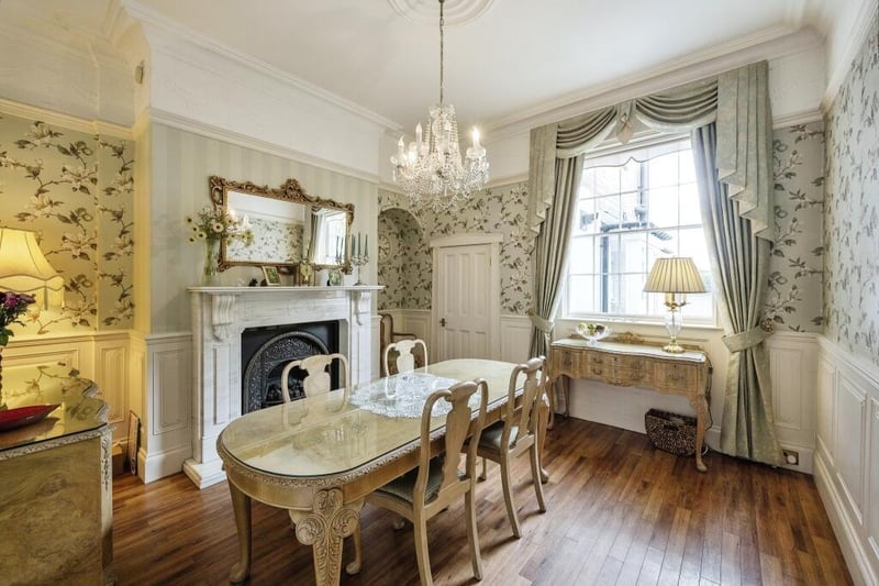 An elegant dining room with period decorative detail.