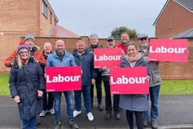 Newly elected councillor Ken Guest with councillors and Labour members.