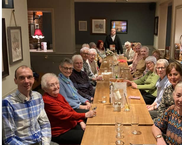 Volunteers were treated to a meal for their long service.