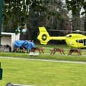 The air ambulance has landed at the scene in Kirk Sandall.