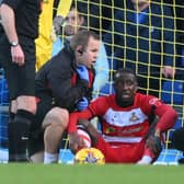 Doncaster Rovers defender Joseph Olowu suffered a concussion against AFC Wimbledon.