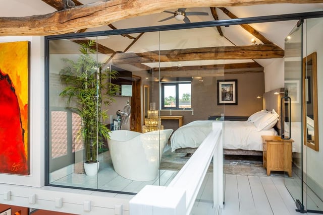 A luxurious bedroom suite within the barn conversion.