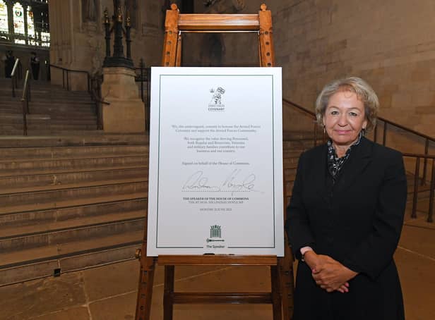 Dame Rosie with the signed Armed Forces Covenant. Credit: ©UK Parliament/Jessica Taylor