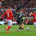 Doncaster Rovers' Luke Molyneux fires home his first of two quickfire goals against Swindon Town.